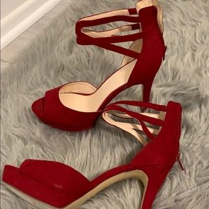 Never been worn red faux suede heels
